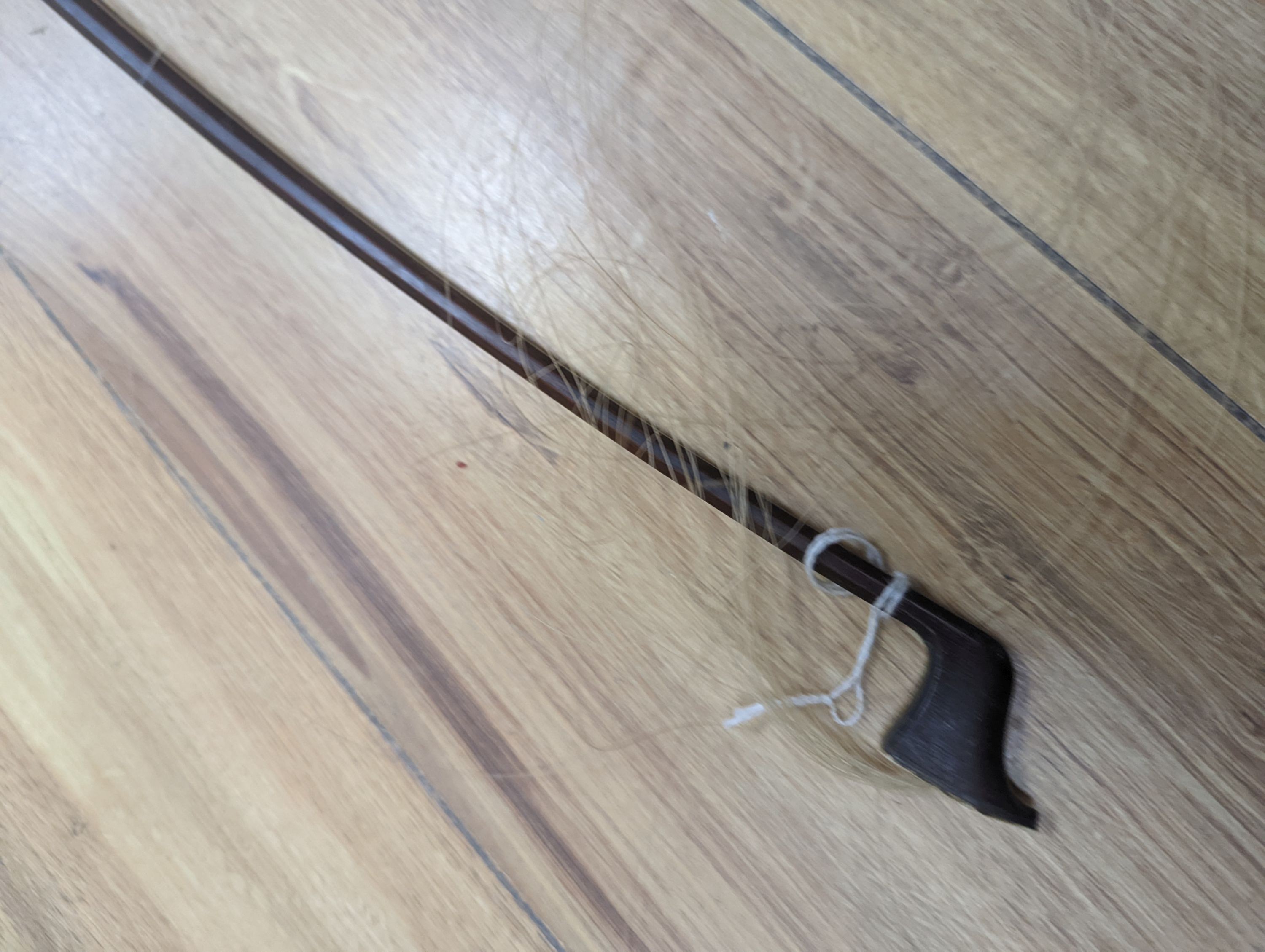 A violin and bow, various records etc